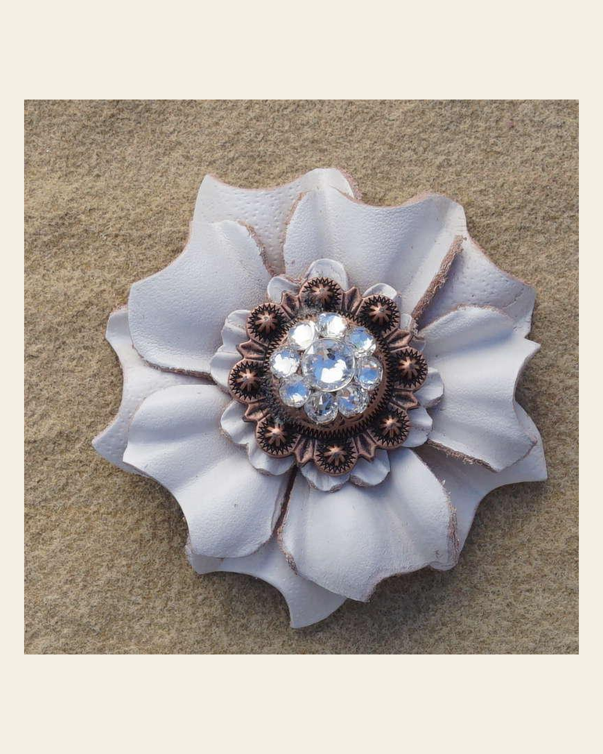 White Carnation Flower With Copper Clear 1" Concho on a warm cream background
