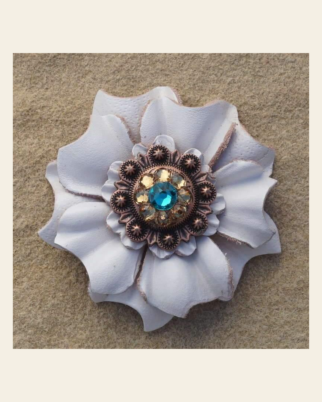 White Carnation Flower With Copper Teal & Champagne 1" Concho on a warm cream background