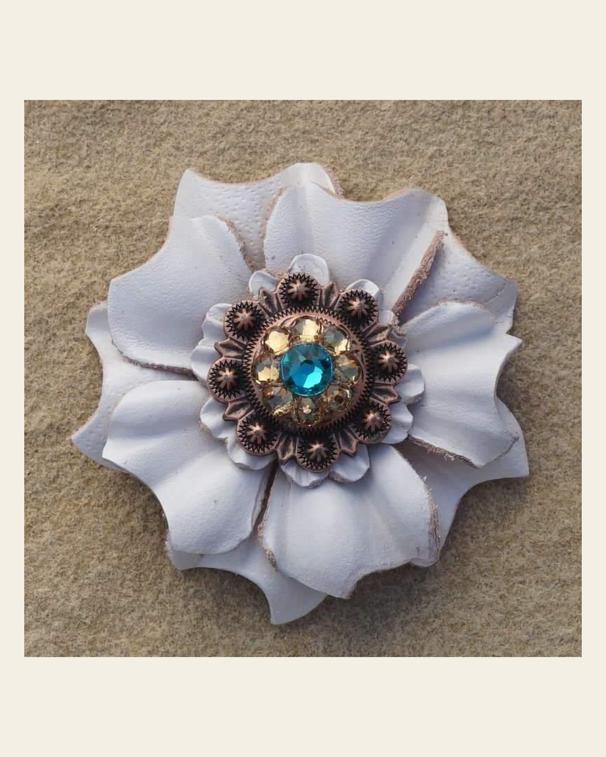 White Carnation Flower With Copper Teal & Champagne 1" Concho on a warm cream background