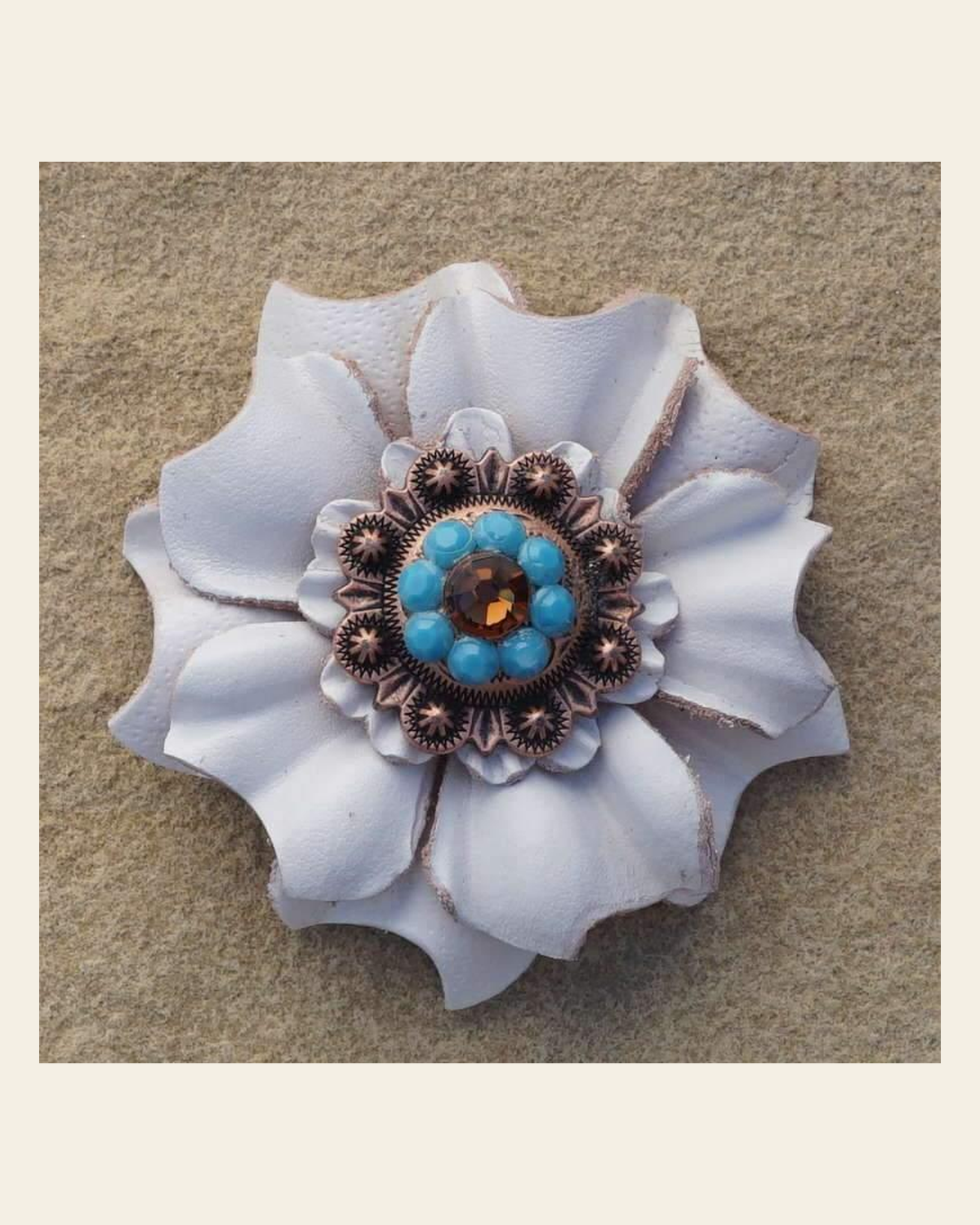 White Carnation Flower With Copper Topaz & Turquoise 1" Concho on a warm cream background