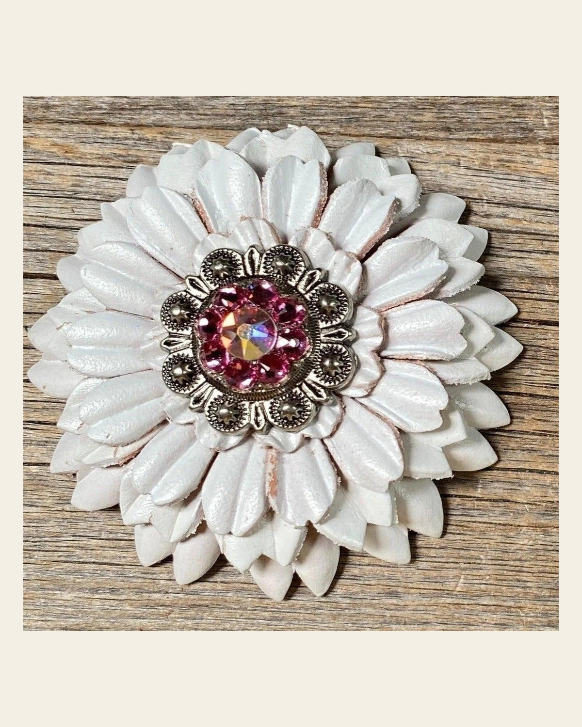 White Daisy Flower With Antique Silver Pink & AB 1" Concho on a warm cream background
