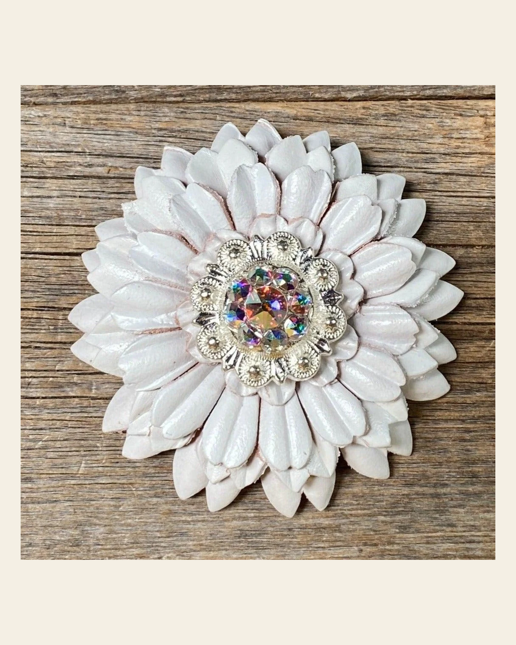 White Daisy Flower With Bright Silver AB 1" Concho on a warm cream background