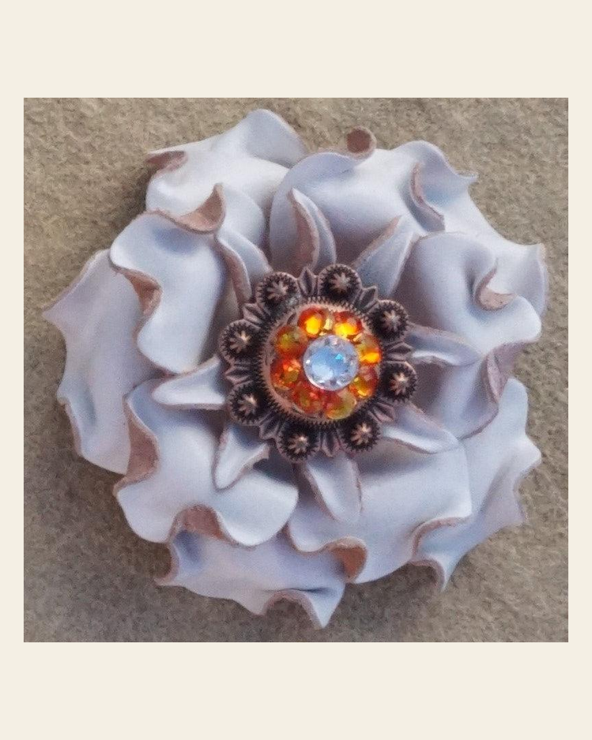 White Gardenia Flower With Copper Fire Opal and Clear 1" Concho on a warm cream background