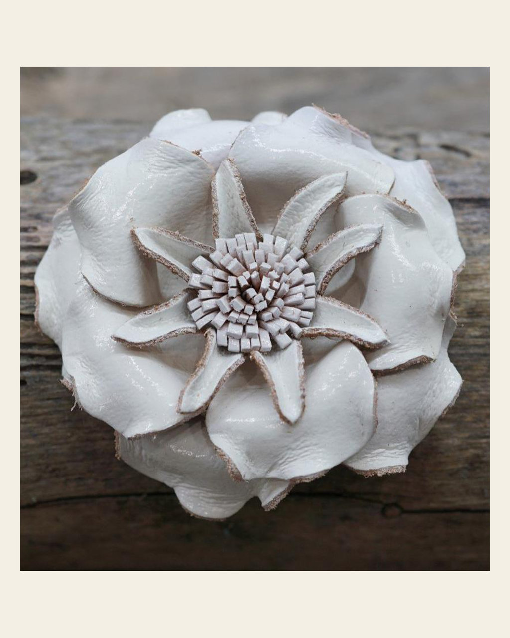 White Gardenia Leather Flower on a warm cream background