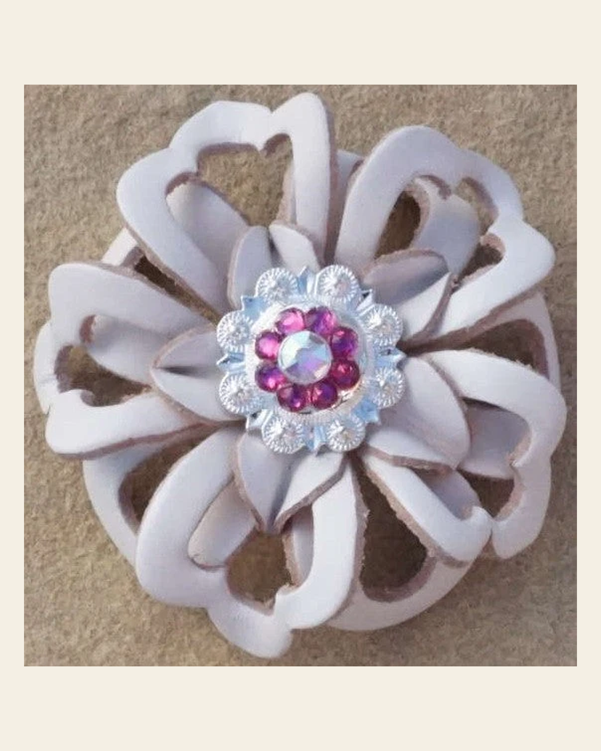 White Lotus Flower With Bright Silver Fuchsia and AB 1" Concho on a warm cream background
