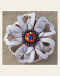 White Lotus Flower With Copper Capri and Fire Opal 1" Concho on a warm cream background