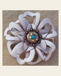 White Lotus Flower With Copper Teal and Champagne 1" Concho on a warm cream background