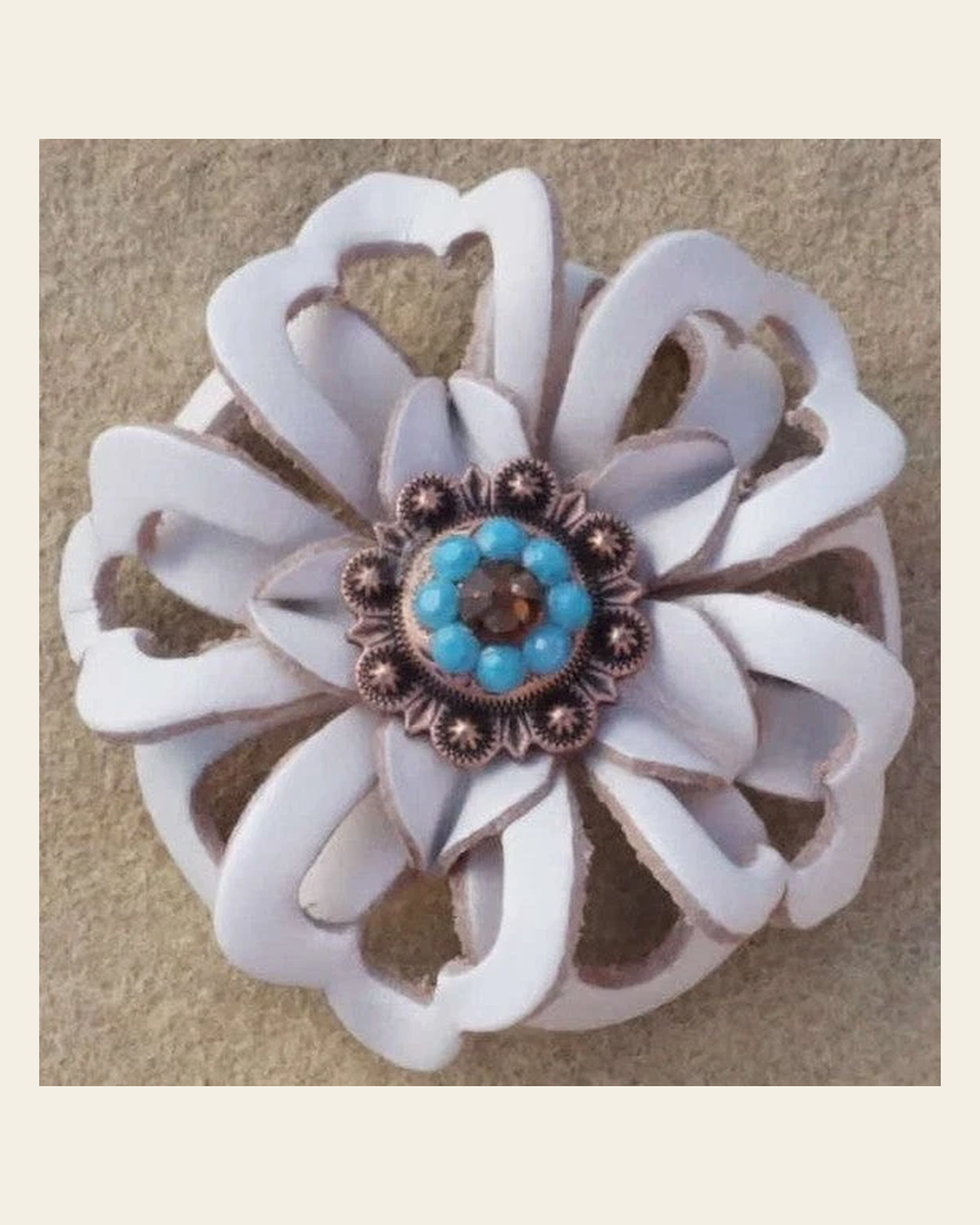 White Lotus Flower With Copper Topaz and Turquoise 1" Concho on a warm cream background