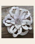 White Lotus Leather Flower on a warm cream background