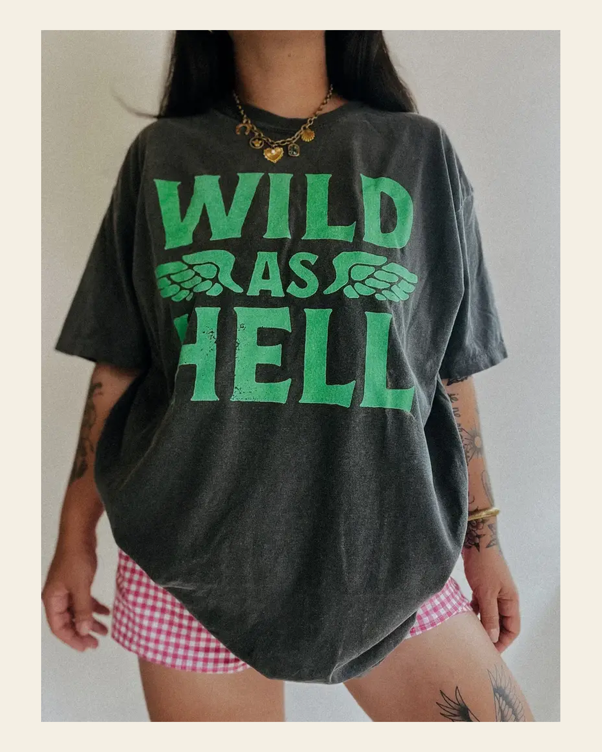 Wild As Hell | Tee on a warm cream background