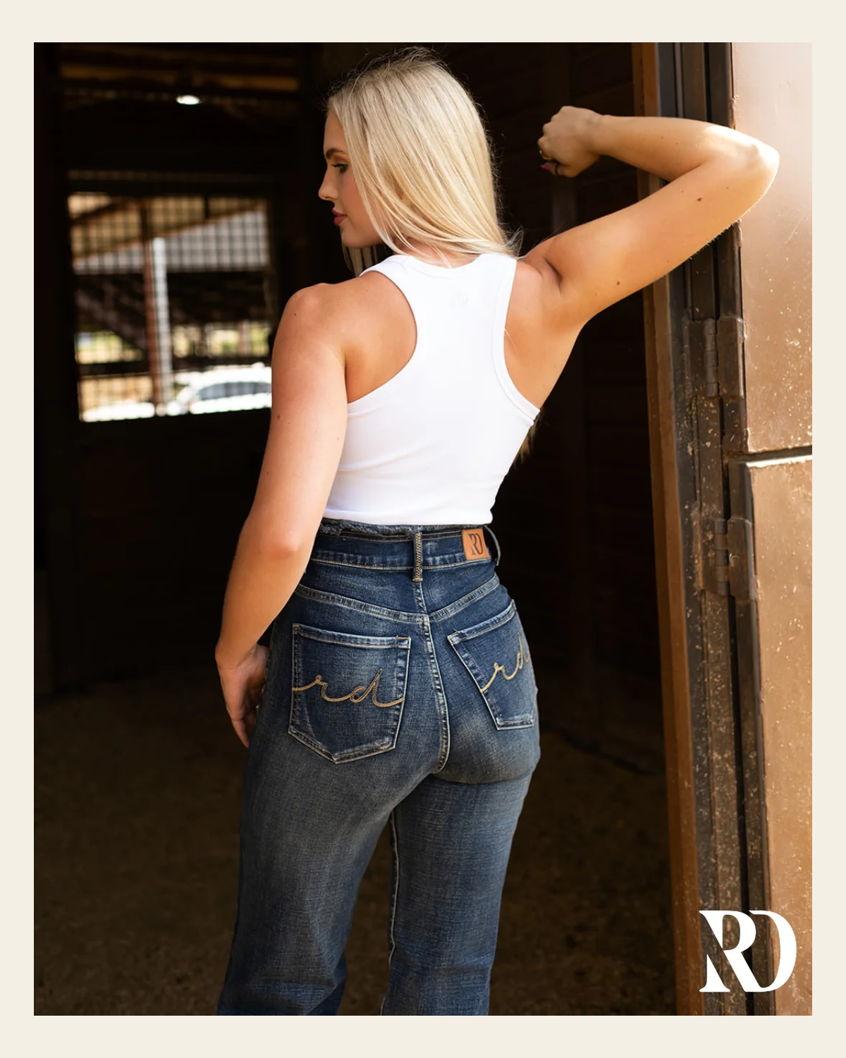 Willow Frayed Vintage Jeans on a warm cream background