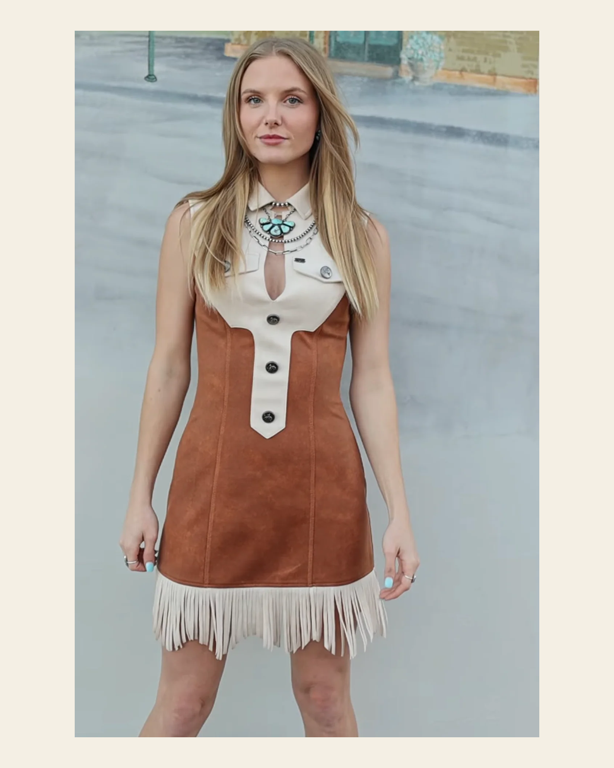 Wynonna Faux Suede Fringe | Dress on a warm cream background