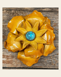 Yellow Gardenia Flower With Round Turquoise Cabochon on a warm cream background