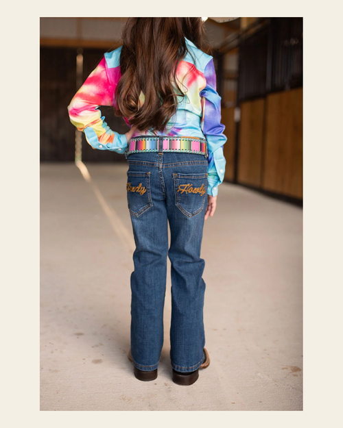 *youth* Howdy Denim Boot Cut Jeans (numerical) on a warm cream background