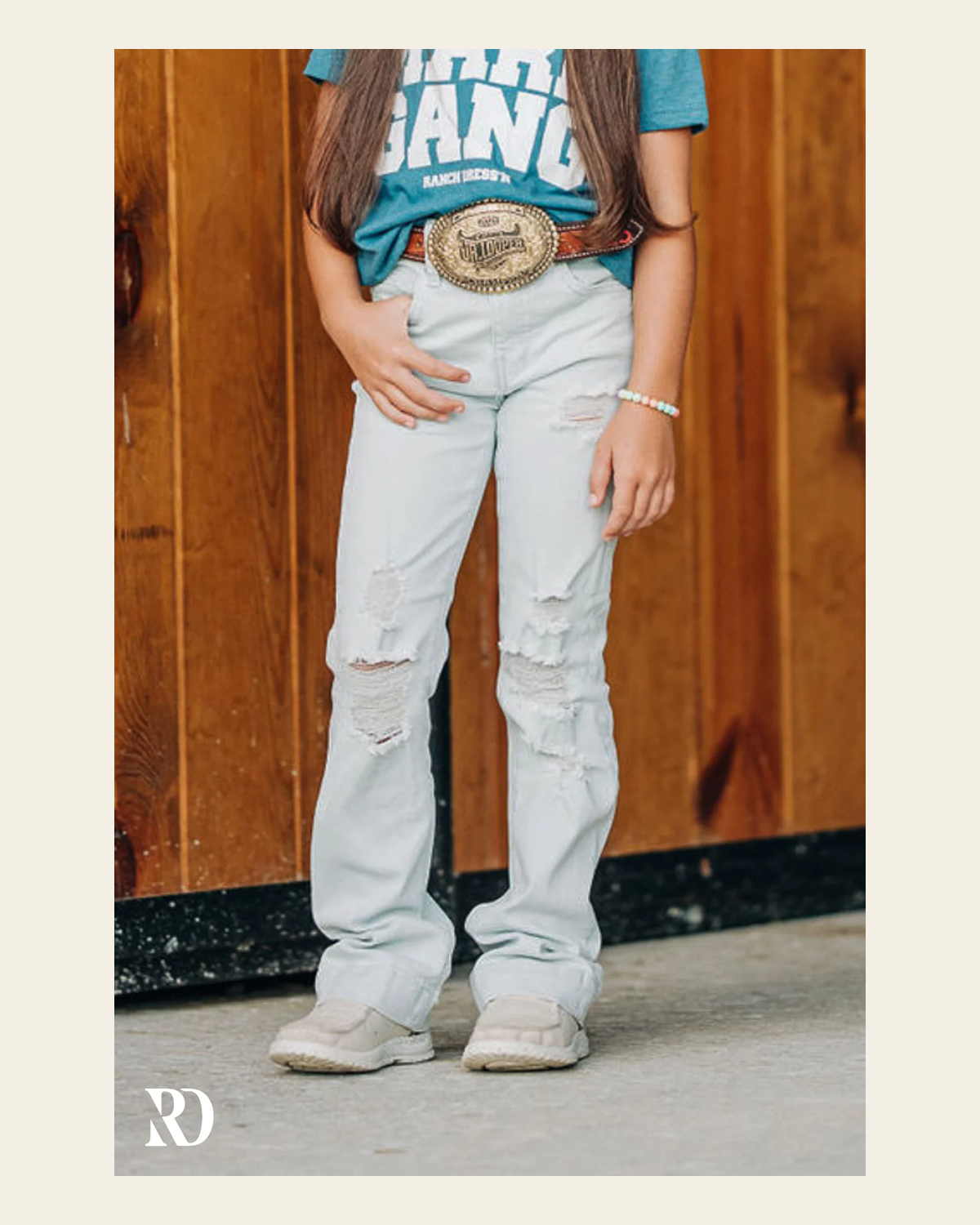 *youth* Signature Straight - Light Wash Distressed on a warm cream background