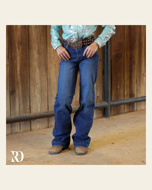 *youth* Signature Trouser- Medium Wash on a warm cream background