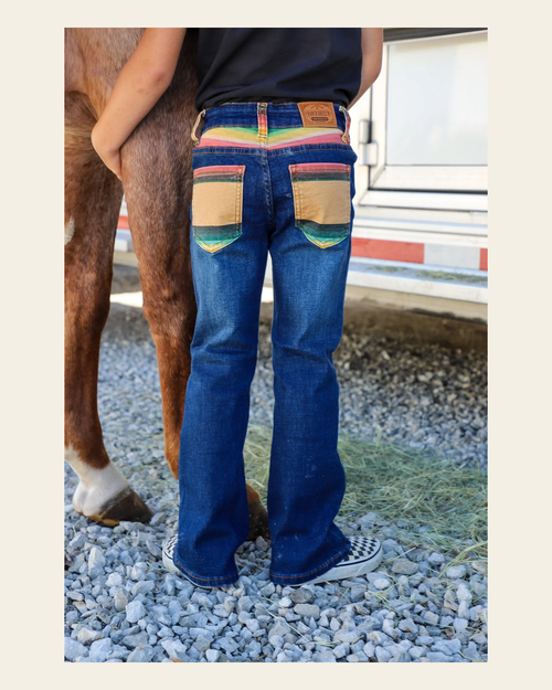*youth* Moab Denim Bootcut Jeans (numerical) on a warm cream background