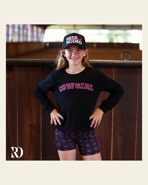 *youth* Vital Bike Shorts | Pink Cattle Brand on a warm cream background