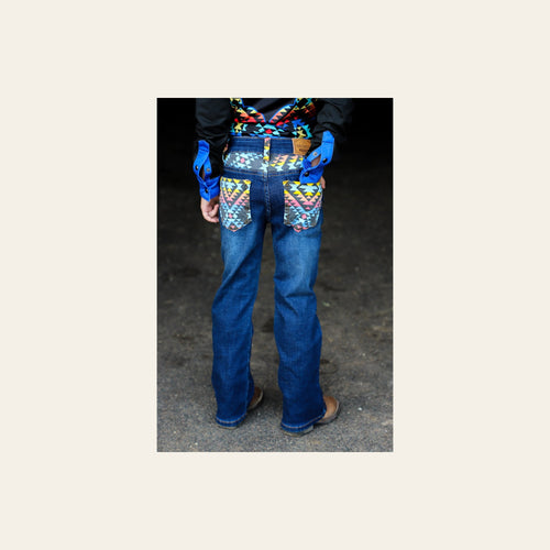 *youth* Arizona Bootcut Denim Jeans on a warm cream background