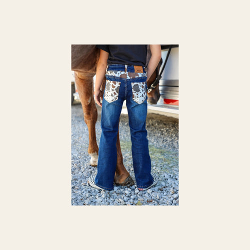 *youth* Cattle Drive Denim Bootcut Jeans on a warm cream background