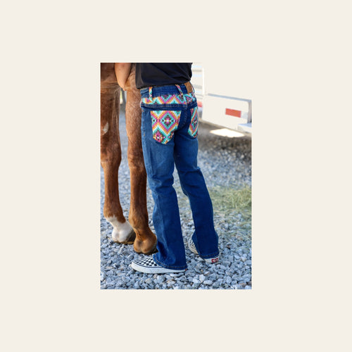 *youth* Dakota Bootcut Denim Jeans on a warm cream background