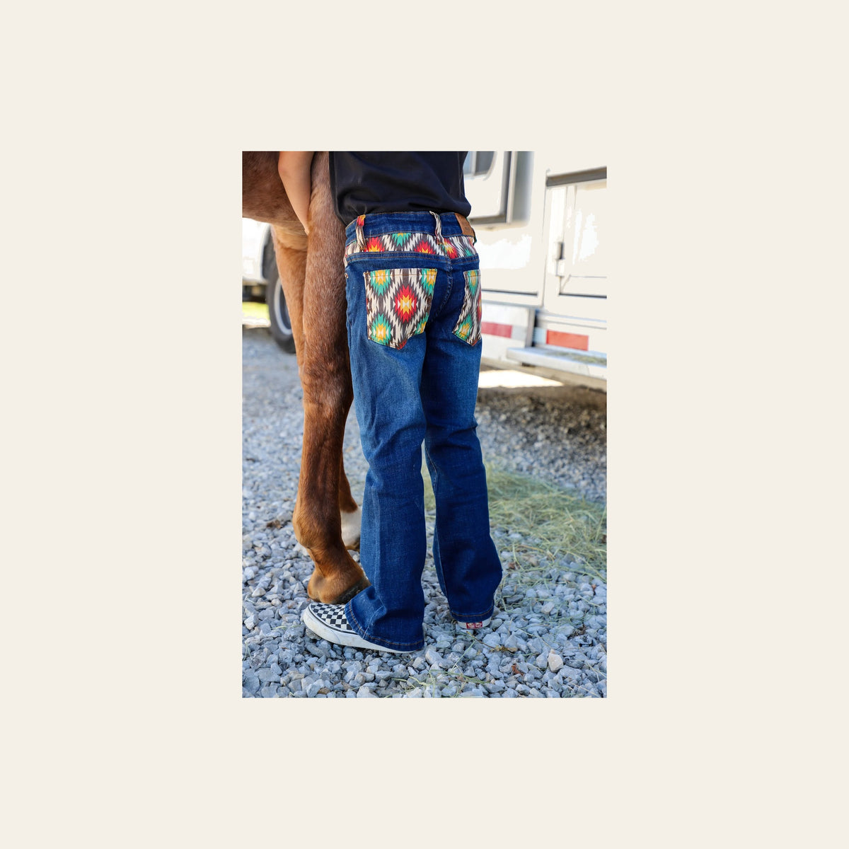 *youth* Hayes Bootcut Denim Jeans on a warm cream background