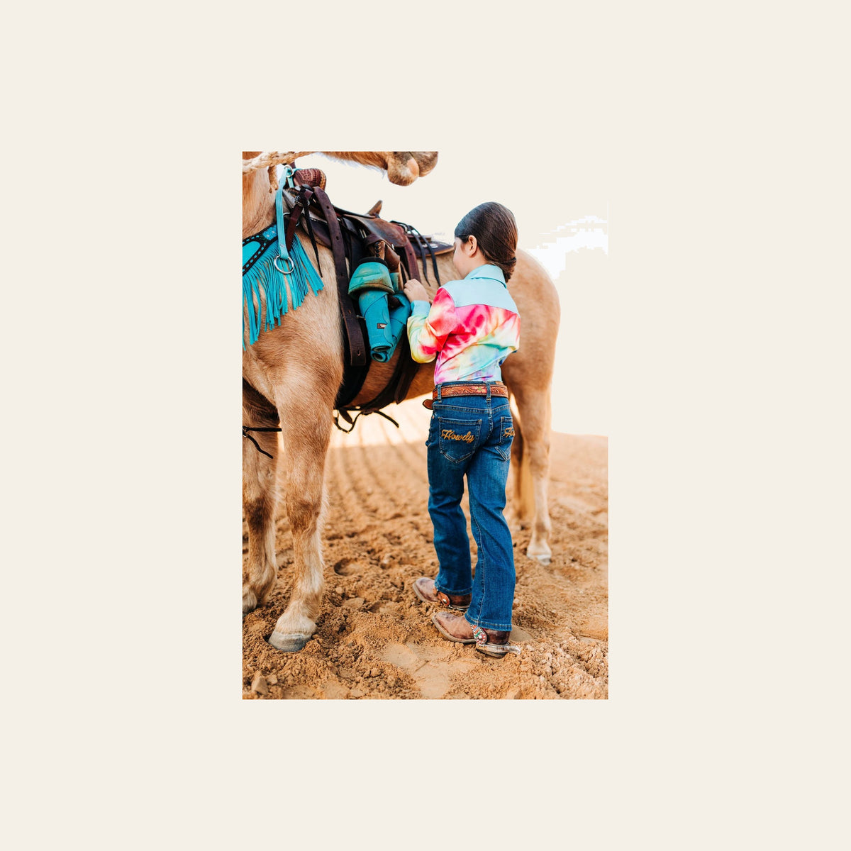 *youth* Howdy Bootcut Denim Jeans on a warm cream background