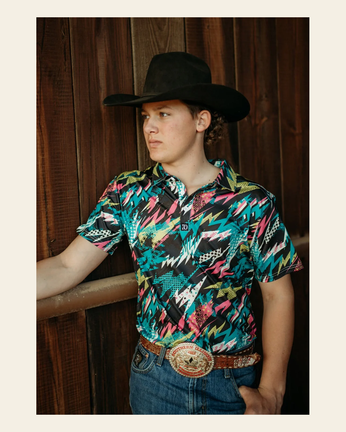 Zack Men's Performance Polo on a warm cream background